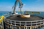 A three phase AC wire of 60 km length and 3.500t of weight connects the first german offshore windpark to the german energy grid.